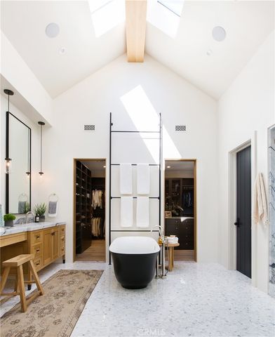 a bathroom with a bathtub and a sink