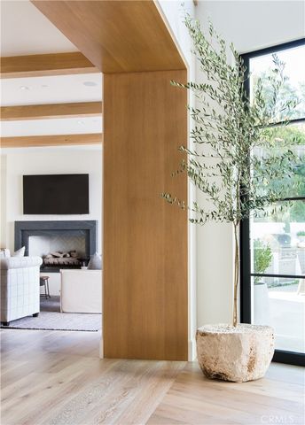 a view of living room filled with furniture and window