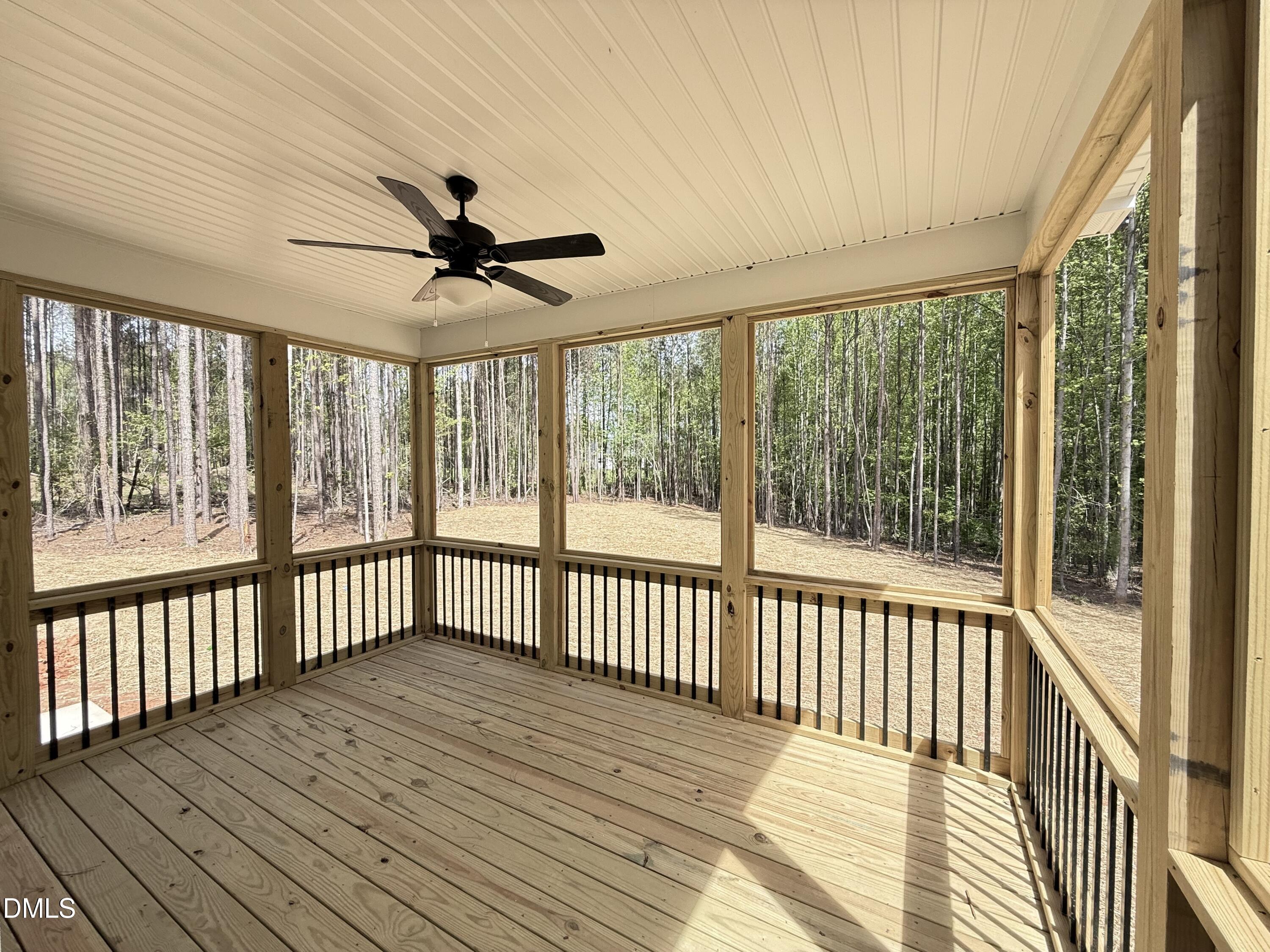 10300 Stallings Road Spring Hope, NC 27882 - Photo 18 of 36 a view of a porch with wooden floor