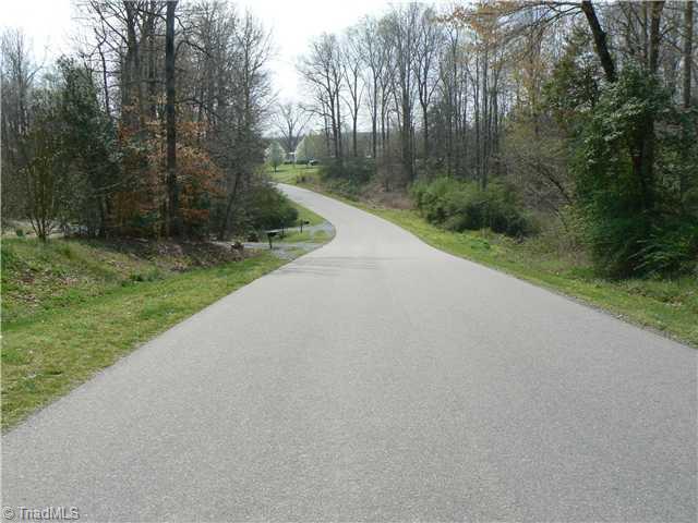 4987 King View Road Asheboro, NC 27205 - Photo 16 of 16 Other. This is the street view looking south with the house to the left. The community is a sparsley populated and peaceful. Thank you for viewing these pictures.
