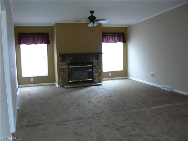 Living Room. As you come in the front door you see the fireplace.  The Living Room/Dining Room is 15  2" X 26  6".  Master Suite is on the left.