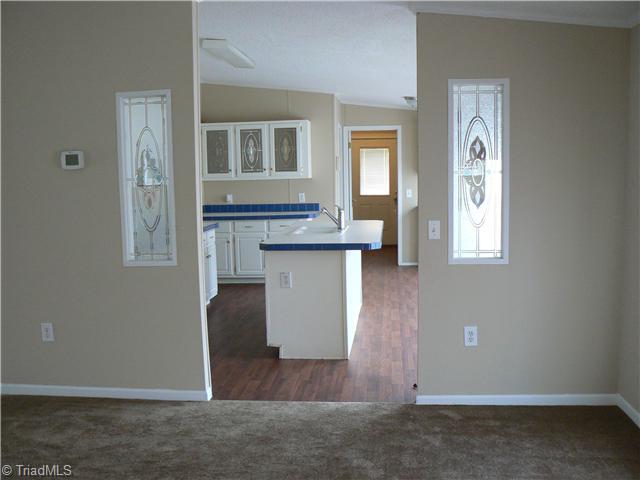 Dining Room. Peering into the Kitchen from the Dining Room portion of the Living Room.