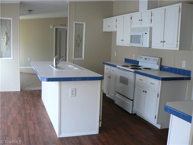 4987 King View Road Asheboro, NC 27205 - Photo 8 of 16 Kitchen. A wider view of the kitchen. Isn t it pretty?
