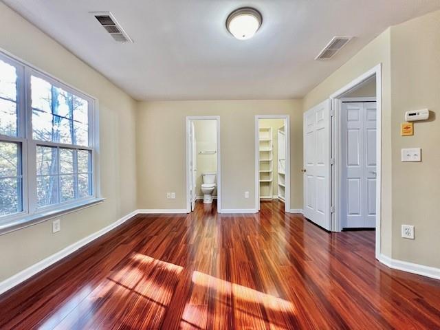 2459 Ivey Crest Circle Tucker, GA 30084 - Photo 16 of 18 a view of empty room with wooden floor and fan