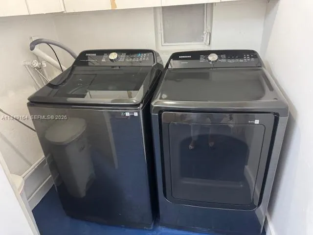 a living room with a rug