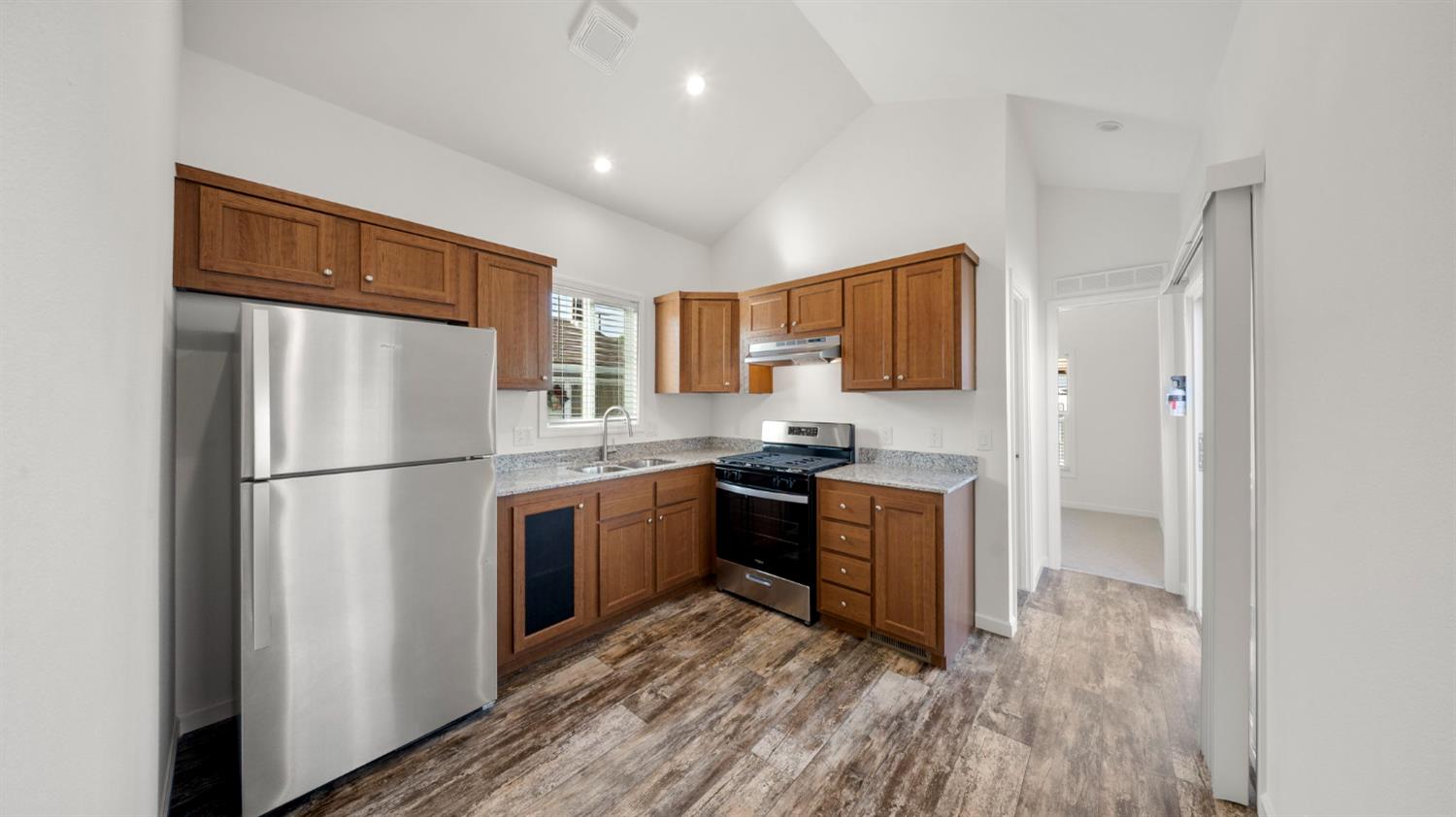 2784 Monterey Road, Unit 43A San Jose, CA 95111 - Photo 5 of 13 a kitchen with stainless steel appliances a refrigerator stove and sink