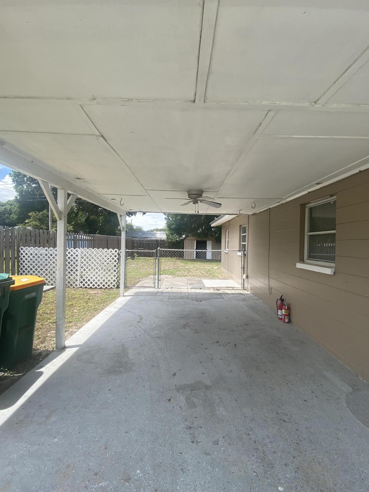 2544 Coventry Road Melbourne, FL 32935 - Photo 2 of 16 carport Conventry Rd