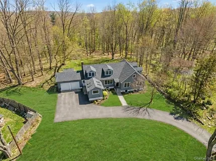 a living room with furniture and white walls