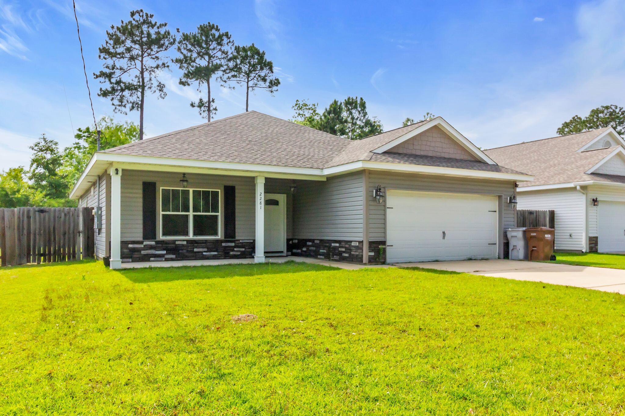 2281 Tom Street Navarre, FL 32566 - Photo 1 of 35 Front