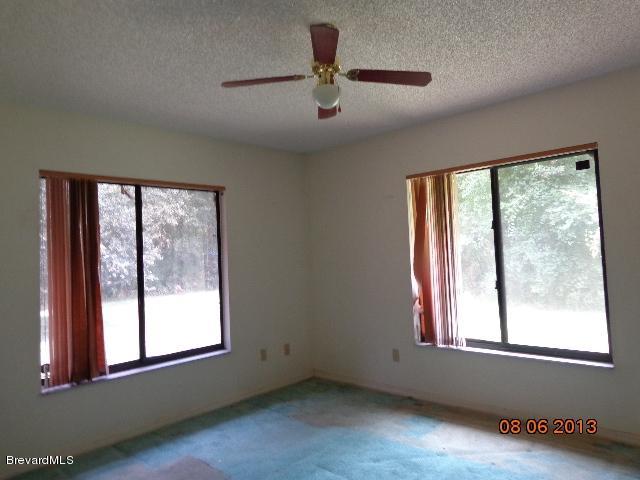 2277 Cox Road Cocoa, FL 32926 - Photo 8 of 10 Master Bedroom