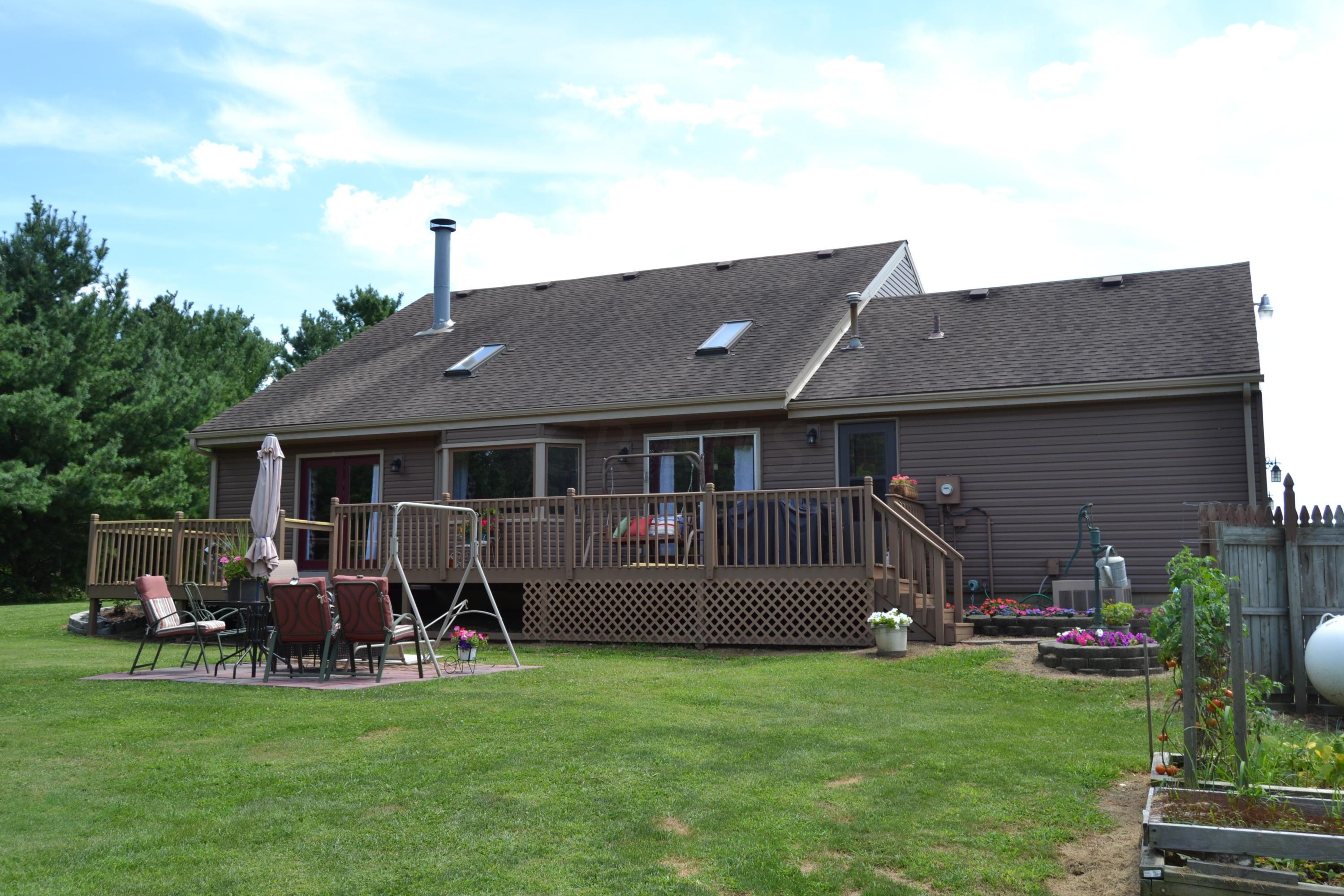 9000 Welsh Road Radnor, OH 43066 - Photo 16 of 28 ENJOY family gatherings on the rear deck and patio, overlooking the large yard!