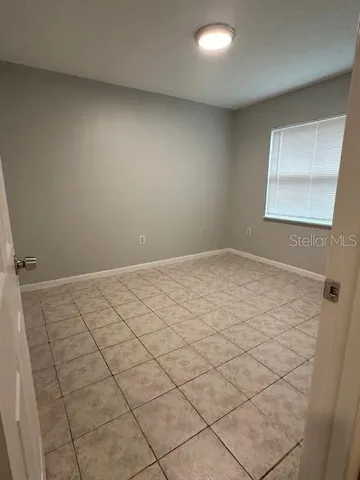 a bathroom with a toilet a sink and bathtub