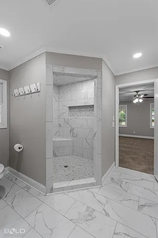 a bathroom with a granite countertop sink mirror and