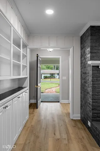a kitchen with stainless steel appliances a refrigerator and a stove