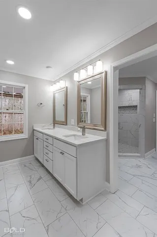a bathroom with a sink a vanity and a mirror