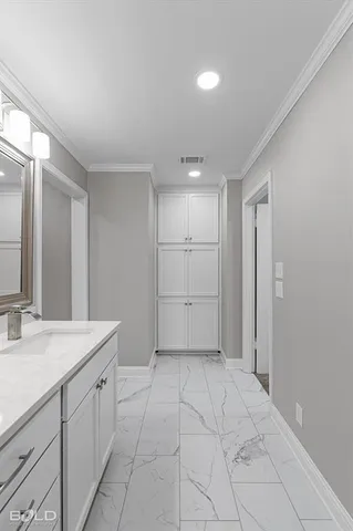 a room with cabinets and window