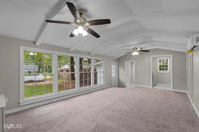 a kitchen that has a sink and a stove