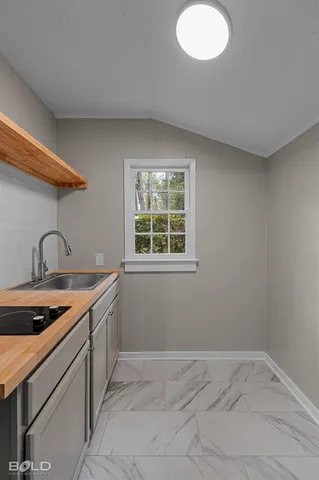 a bathroom with a sink and a vanity