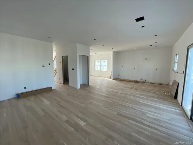 a bathroom with a tub and a shower