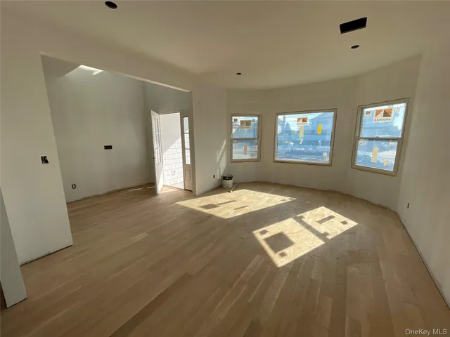 a kitchen with stainless steel appliances granite countertop a sink stove and wooden cabinets