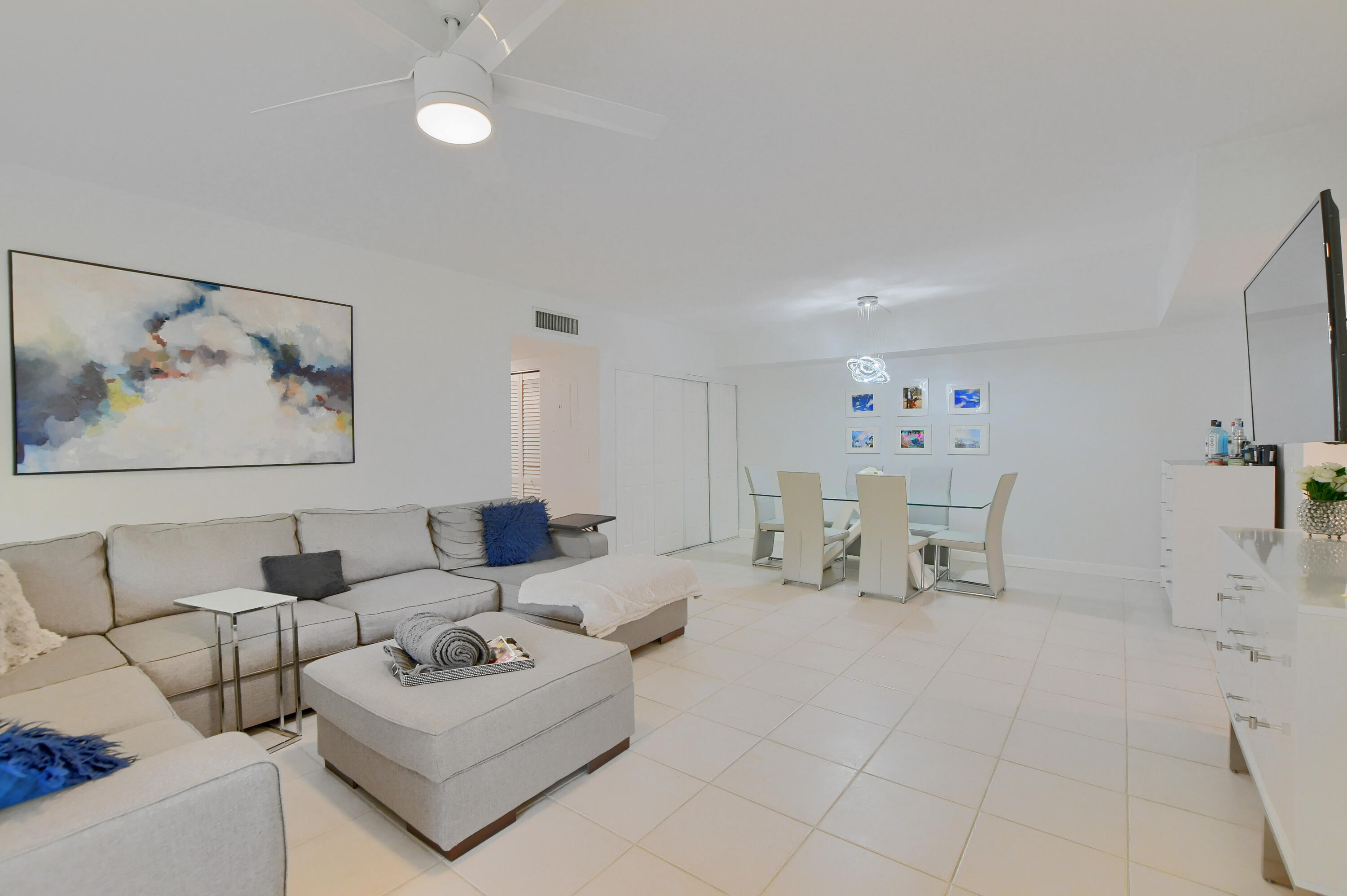 6314 Longboat Lane West, Unit 102 Boca Raton, FL 33433 - Photo 6 of 24 living and dining room