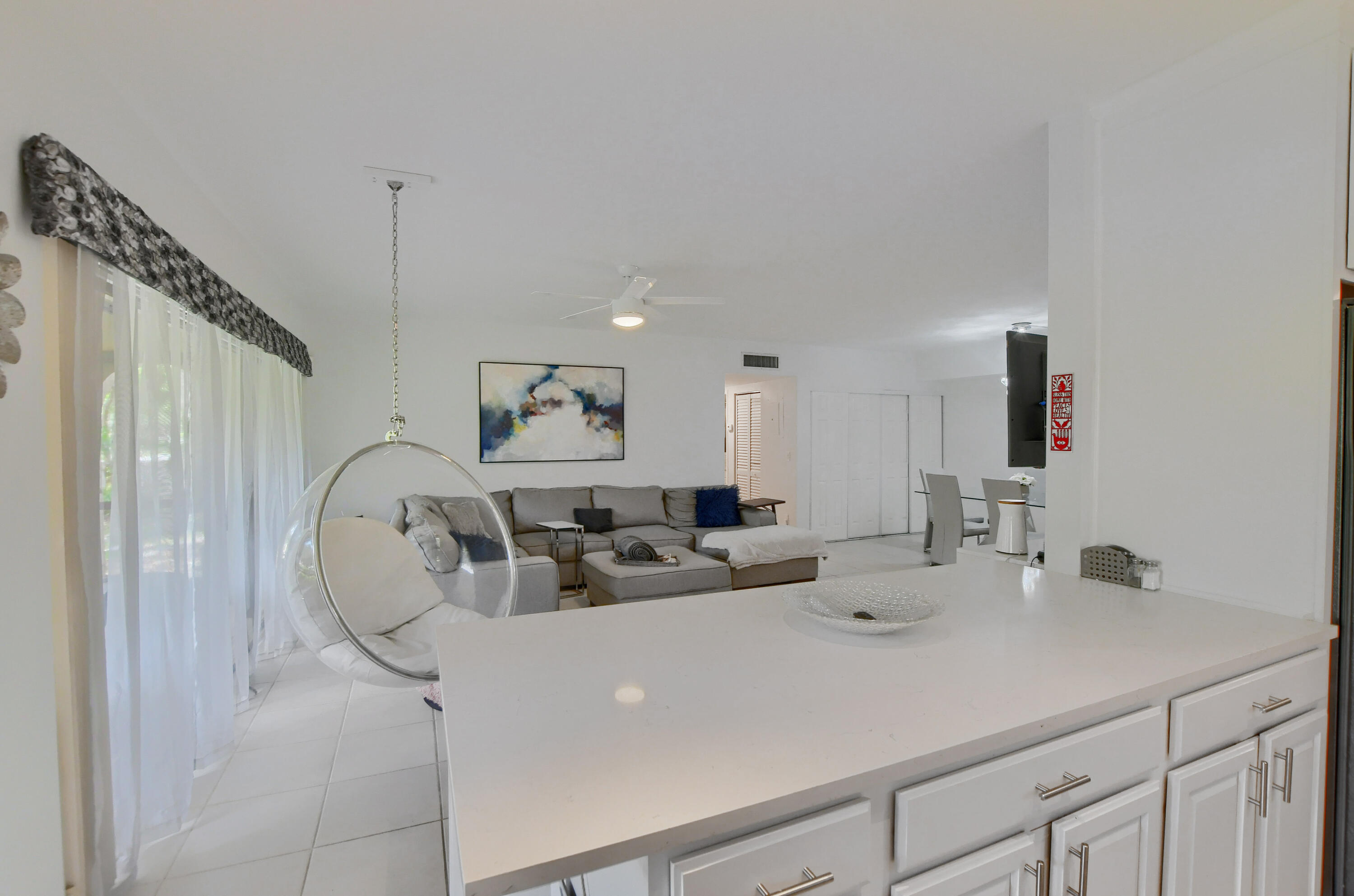 6314 Longboat Lane West, Unit 102 Boca Raton, FL 33433 - Photo 10 of 24 kitchen open to living room