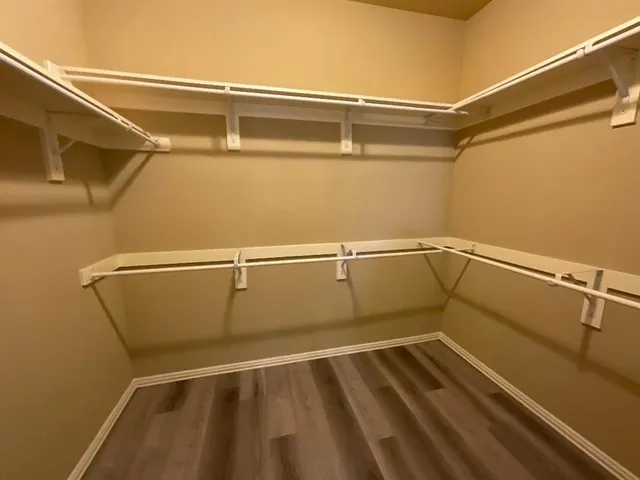 a view of a room with racks on the wall