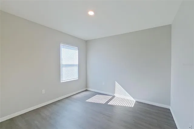 an empty room with a window