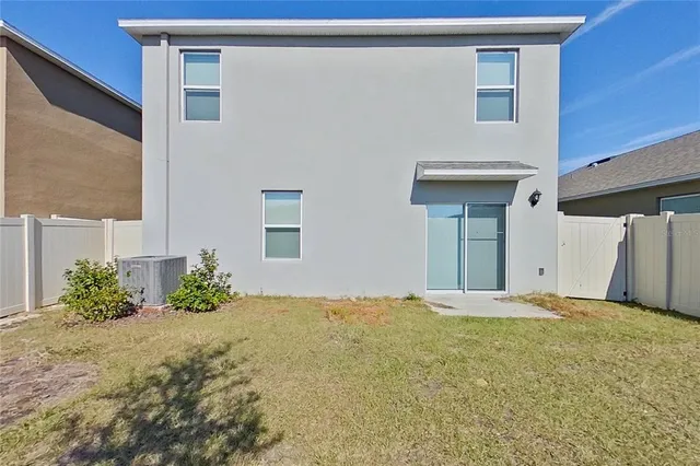 a view of a backyard of a house