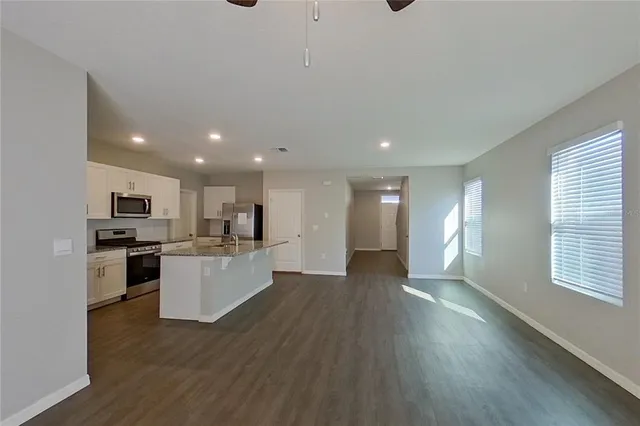 a view of kitchen with wooden floor