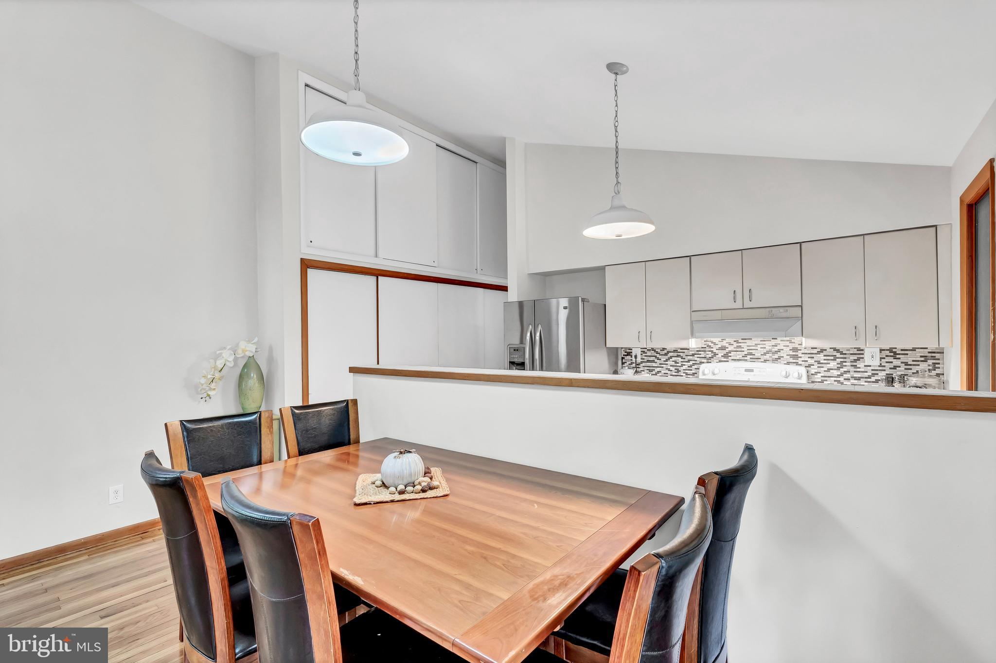 12211 Brookhaven Drive Silver Spring, MD 20902 - Photo 19 of 54 Breakfast Room with Pendant Lighting