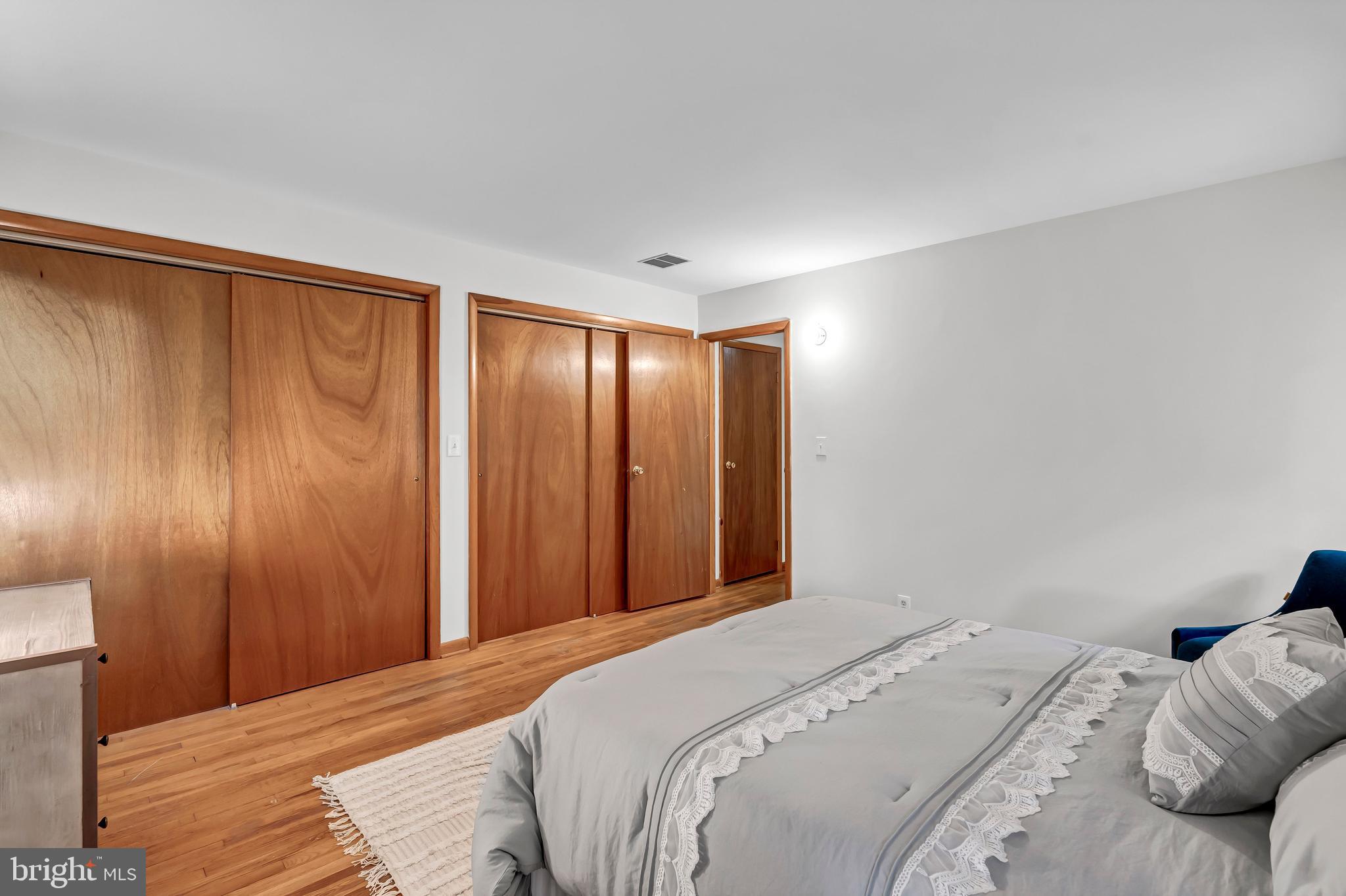 12211 Brookhaven Drive Silver Spring, MD 20902 - Photo 27 of 54 Primary Bedroom with a Wall of Closets