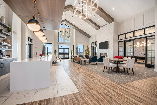 a living room with lots of furniture and a flat screen tv