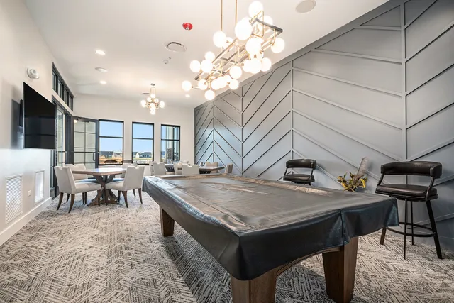 a view of a living room and kitchen