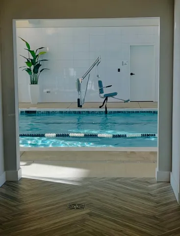 a view of a swimming pool and lake view