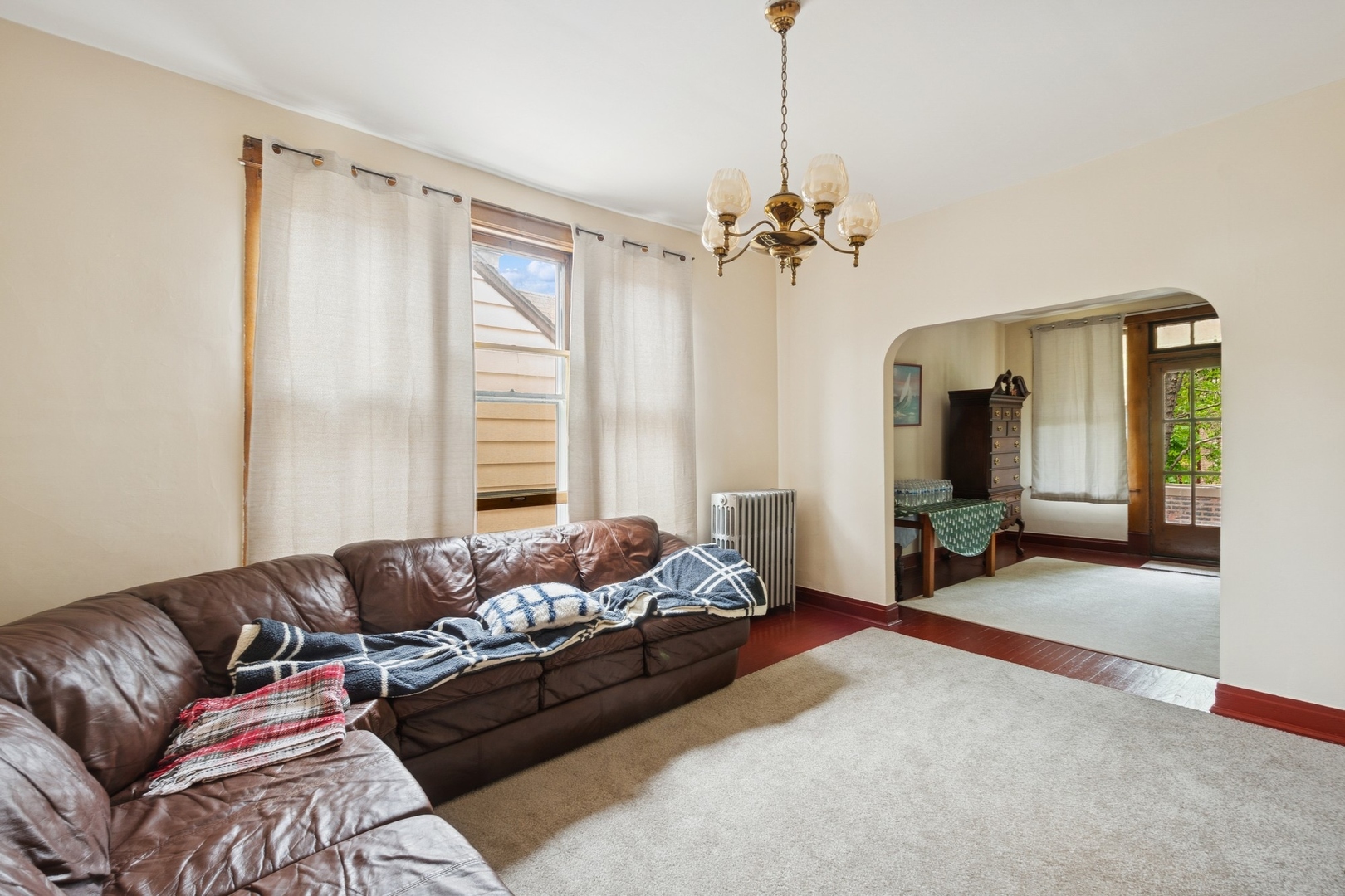 2627 West Rice Street Chicago, IL 60622 - Photo 3 of 14 a spacious bedroom with a bed couch and a window