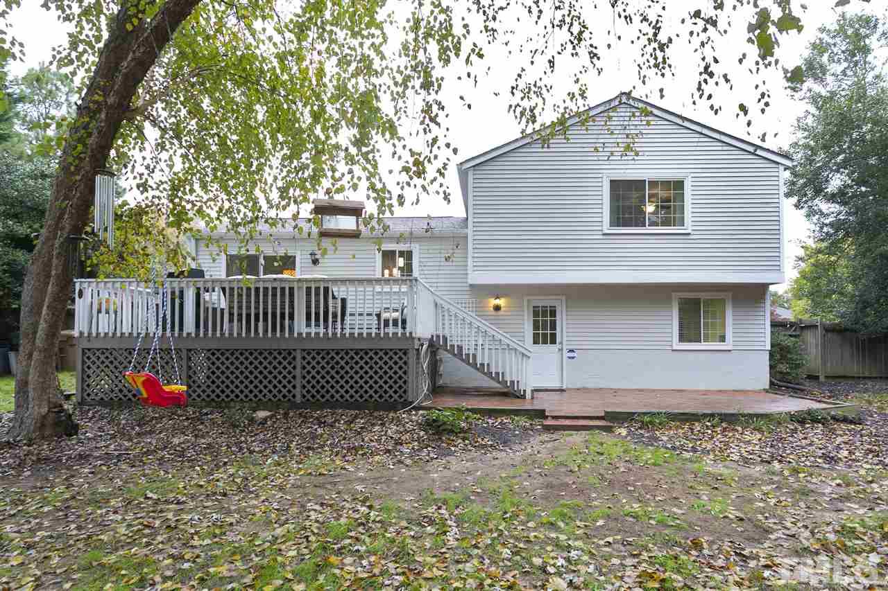 408 Electra Drive Cary, NC 27513 - Photo 23 of 25 a front view of a house with garden