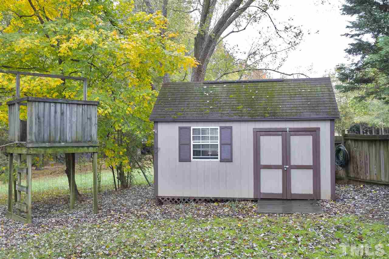 408 Electra Drive Cary, NC 27513 - Photo 25 of 25 a front view of a house with garden