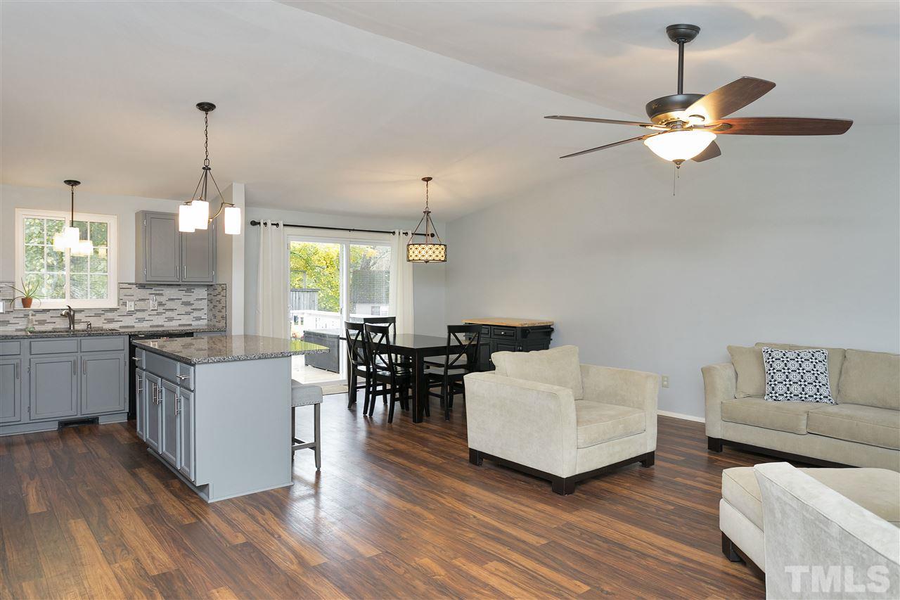 408 Electra Drive Cary, NC 27513 - Photo 4 of 25 a living room with furniture and view of kitchen