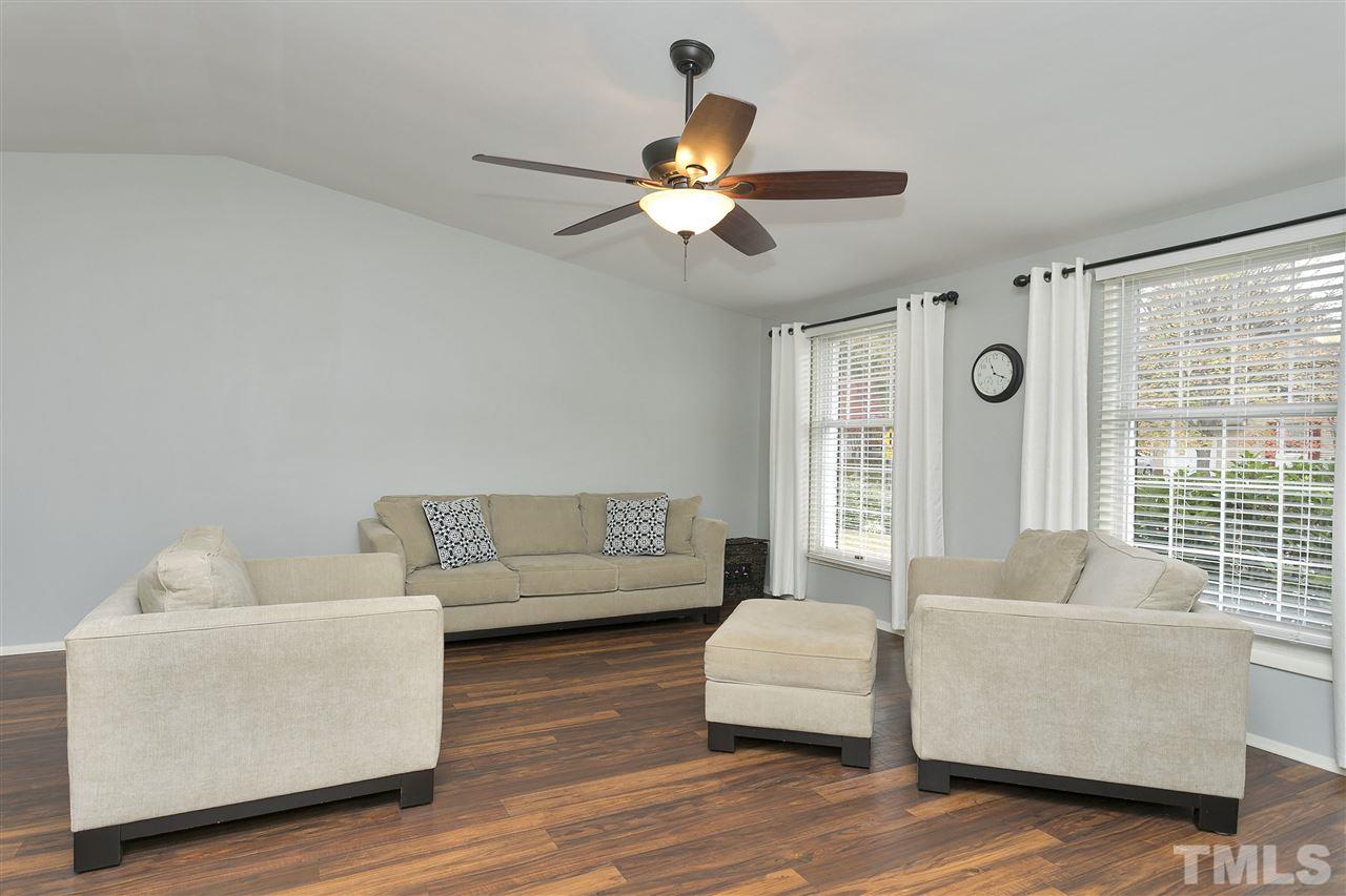 408 Electra Drive Cary, NC 27513 - Photo 10 of 25 a living room with furniture and a large window
