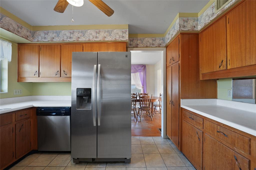 612 West Whidden Street Arcadia, FL 34266 - Photo 12 of 58 a kitchen with stainless steel appliances granite countertop a refrigerator and a sink