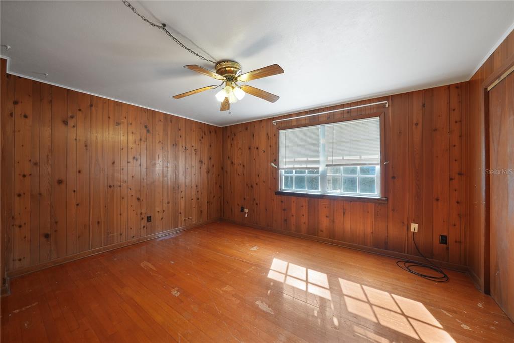 612 West Whidden Street Arcadia, FL 34266 - Photo 19 of 58 an empty room with windows and fan