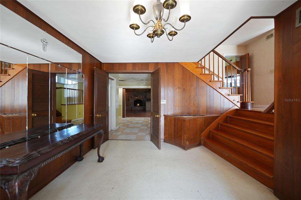 612 West Whidden Street Arcadia, FL 34266 - Photo 2 of 58 a view of entryway and hall with wooden floor