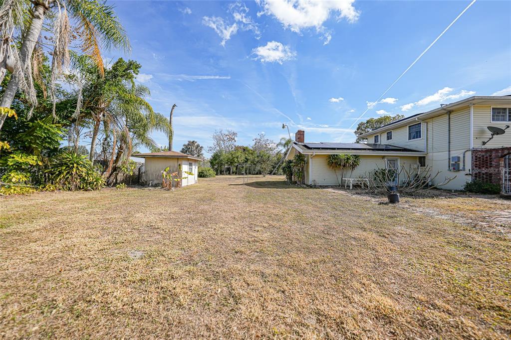 612 West Whidden Street Arcadia, FL 34266 - Photo 46 of 58 a view of a house with a patio