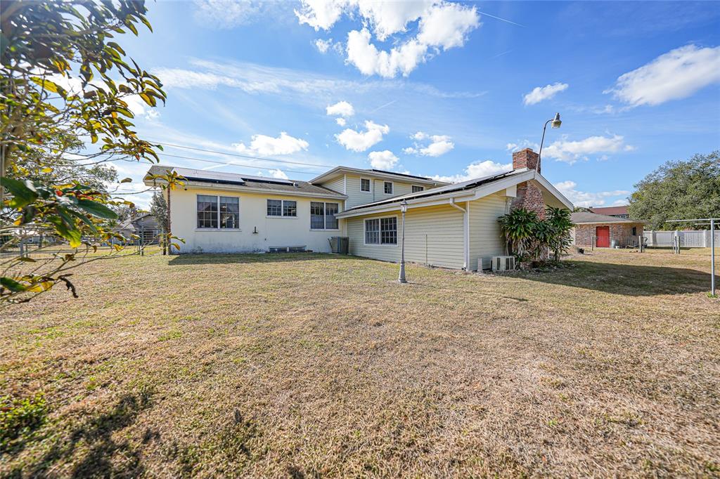 612 West Whidden Street Arcadia, FL 34266 - Photo 49 of 58 a view of a house with a yard