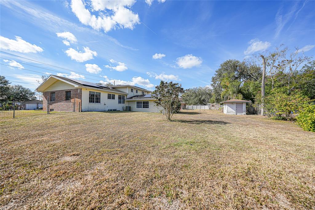 612 West Whidden Street Arcadia, FL 34266 - Photo 50 of 58 a front view of a house with a yard