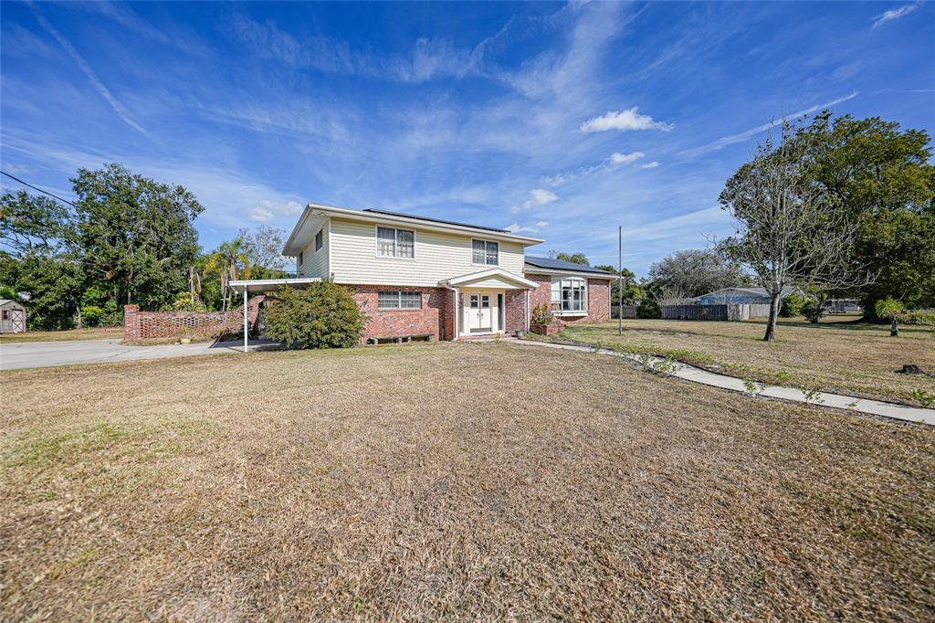 612 West Whidden Street Arcadia, FL 34266 - Photo 51 of 58 a view of a house with a yard