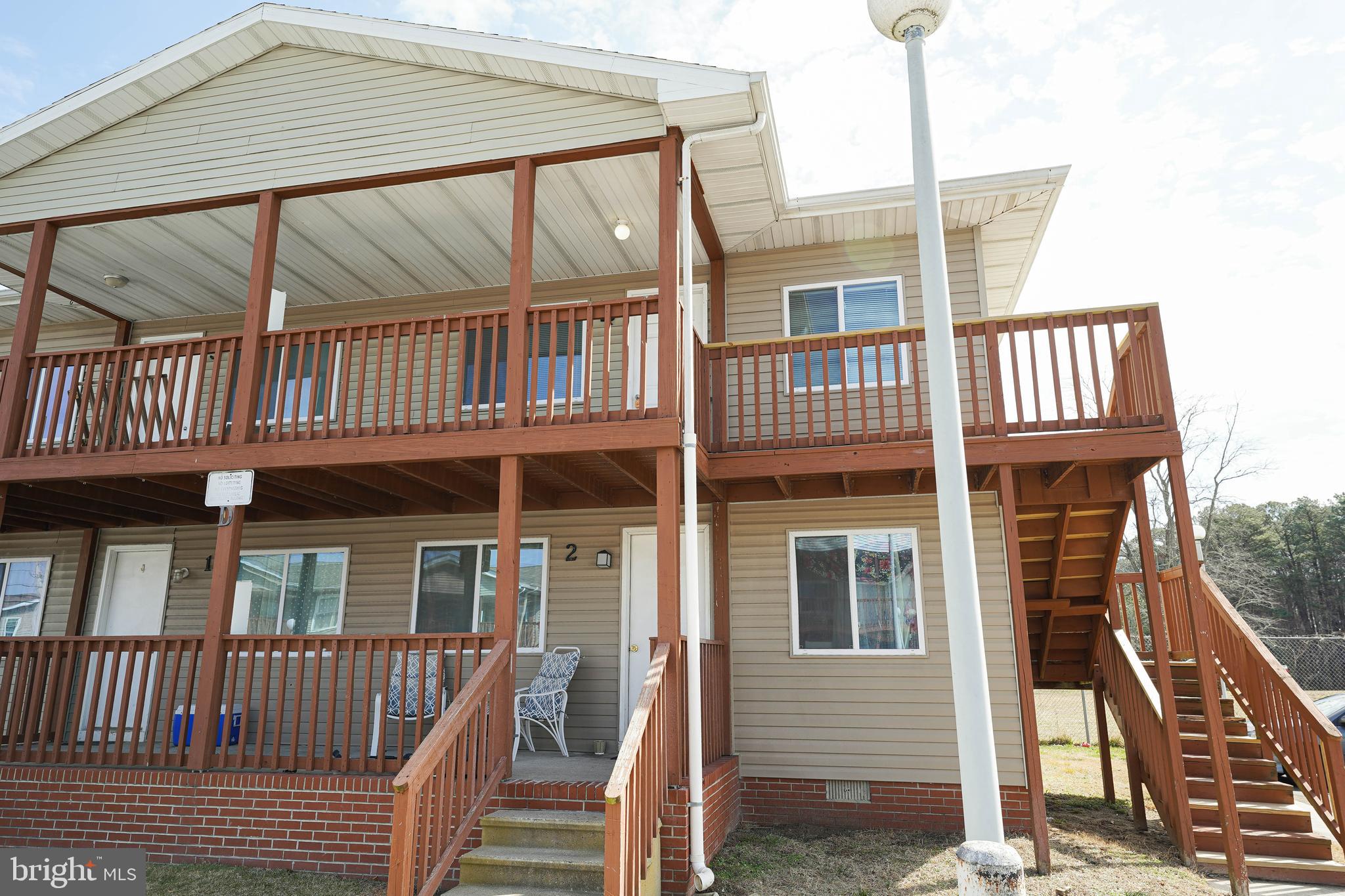 516 Bay Street, Unit D4 Berlin, MD 21811 - Photo 1 of 27 a view of a house with a deck