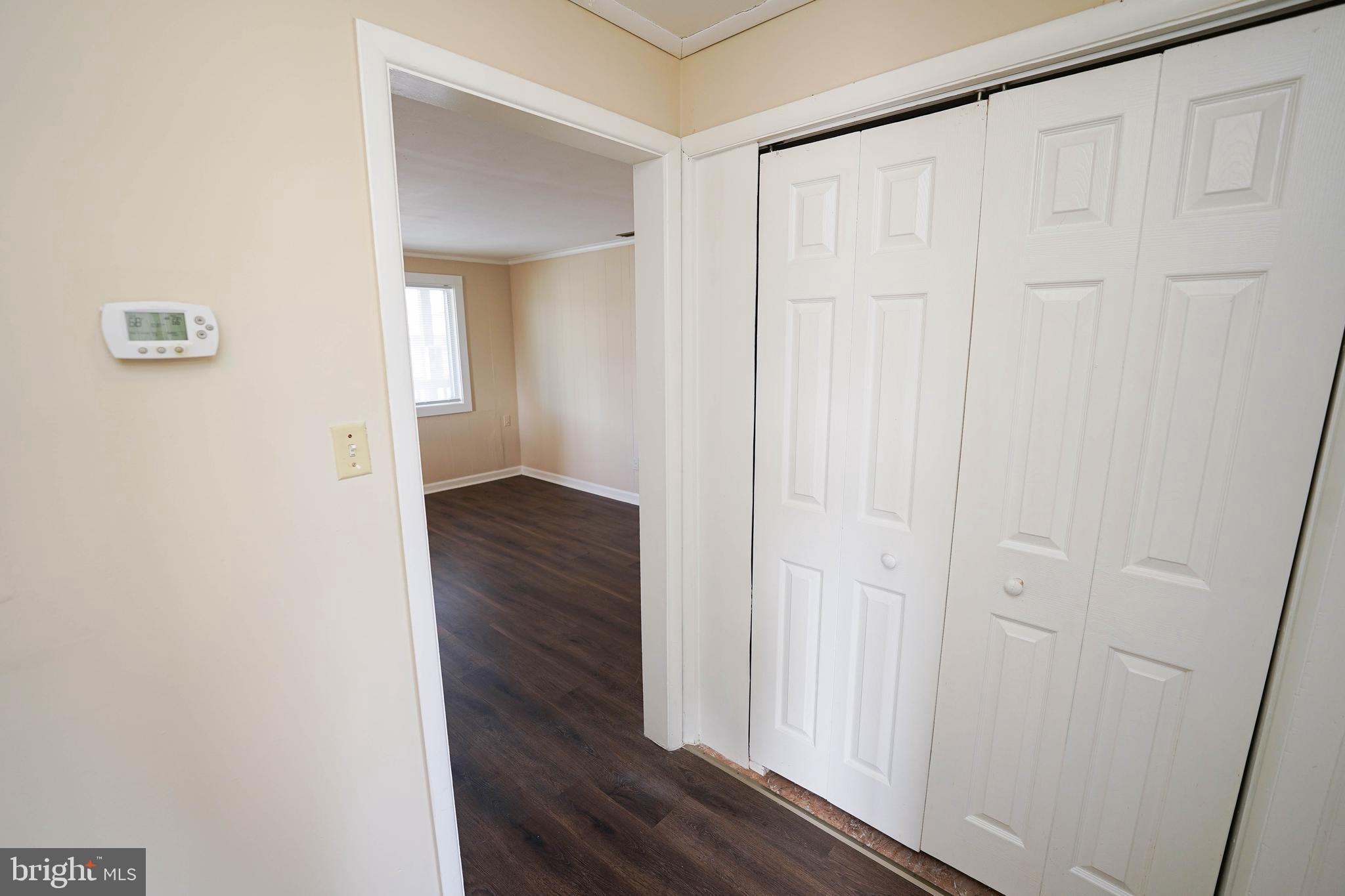516 Bay Street, Unit D4 Berlin, MD 21811 - Photo 15 of 27 a view of wooden floor