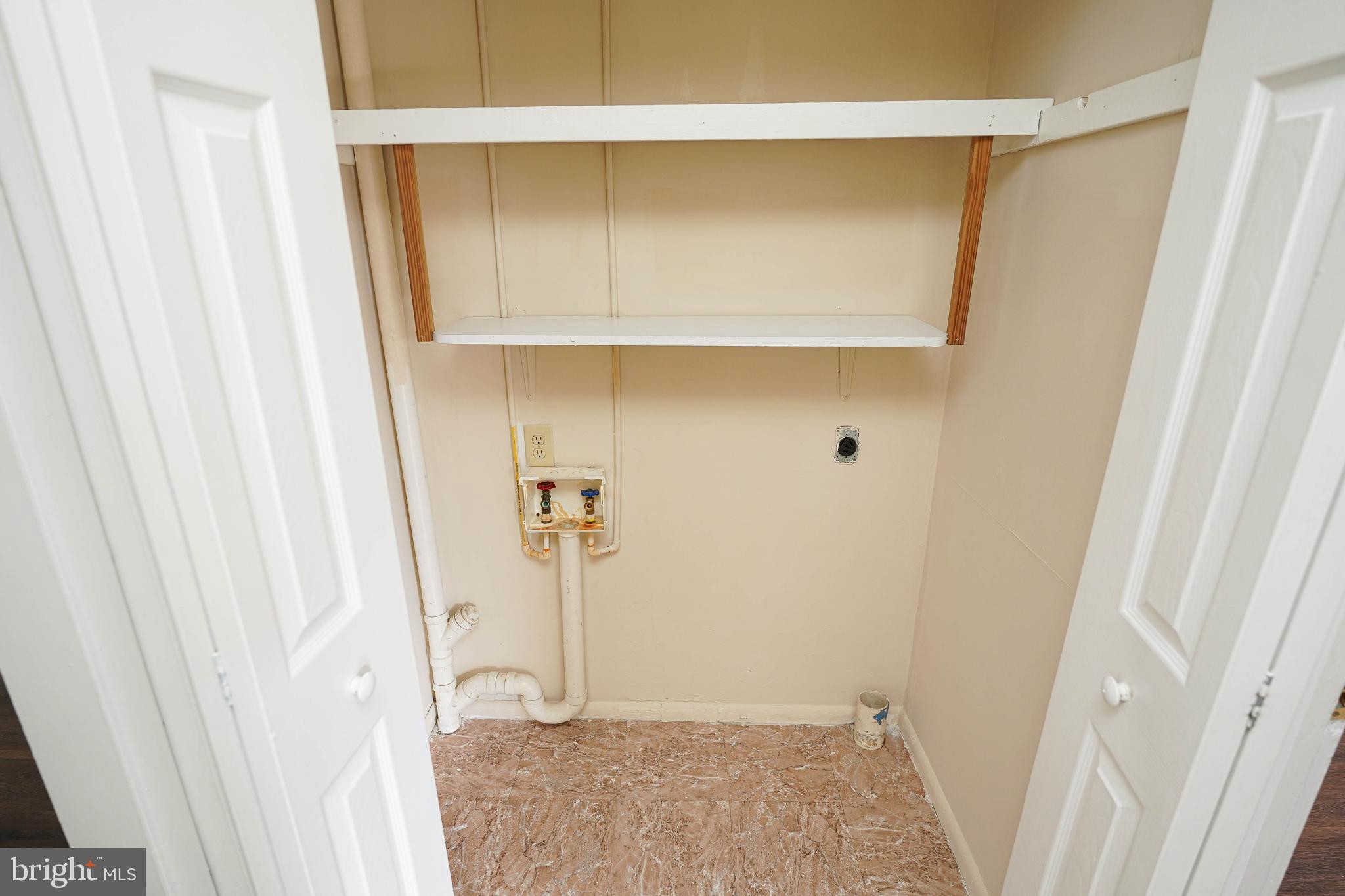 516 Bay Street, Unit D4 Berlin, MD 21811 - Photo 16 of 27 a bathroom with a sink